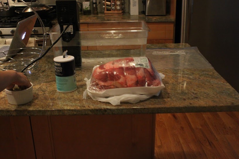 The pork shoulder fresh from the store. Looks far smaller at this distance than it feels trying to move it while hot.