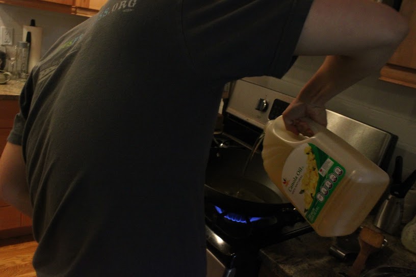 Pouring the canola oil. I suppose you can also call it a bit of inadvertent product placement for S&S.