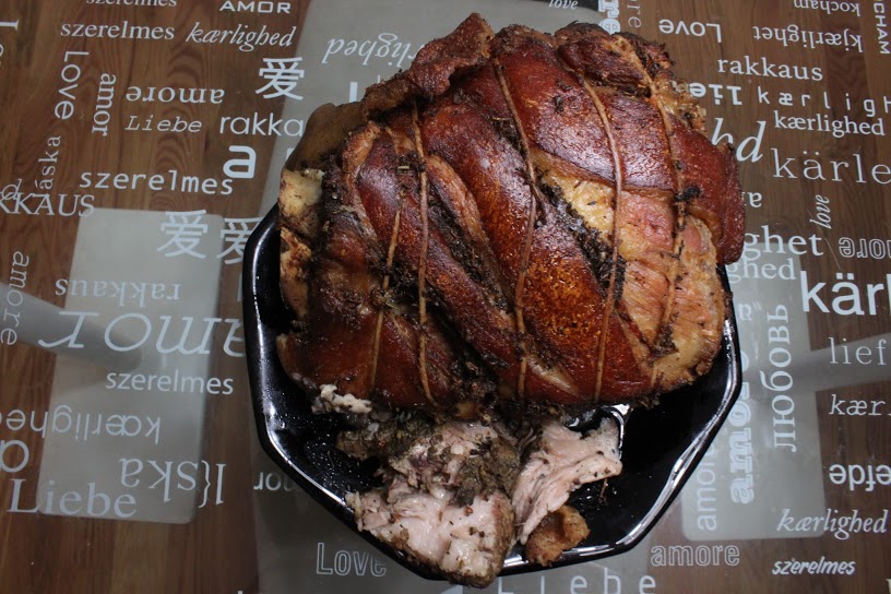 As delicious as it looks. The meat the bottom came out with the bone when it slid out of the porchetta.